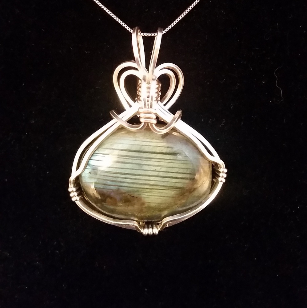 Handmade wire wrapped stone pendant